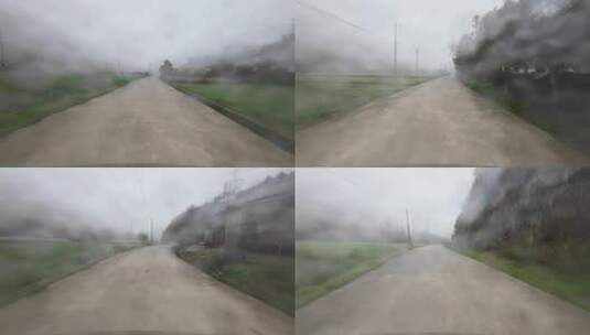 清晨汽车行驶在大雾天的乡间道路高清在线视频素材下载