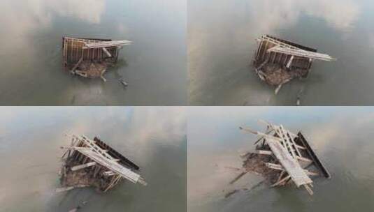 伊恩飓风过后，无人驾驶飞机在波利岛破碎码头的轨道上拍摄。高清在线视频素材下载