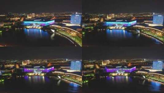 扬州西区明月湖大桥京华城商圈夜景灯光航拍高清在线视频素材下载