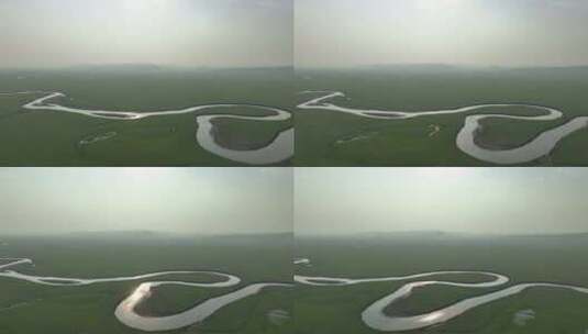 航拍烟雾蒙蒙的草原曲河莫尔格勒河高清在线视频素材下载