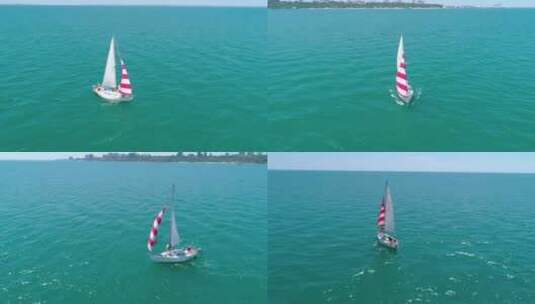 海上帆船。海上浮动帆船的无人机视图高清在线视频素材下载