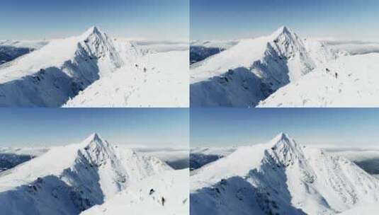 滑雪者在积雪覆盖的山上行走高清在线视频素材下载