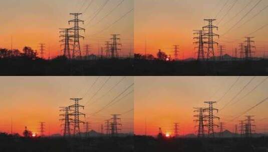 夕阳下电网高压电网铁塔航拍高清在线视频素材下载