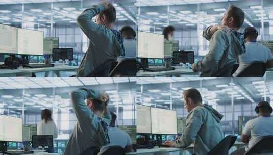 疲劳的管理员在服务器机房工作时伸展身体以高清在线视频素材下载