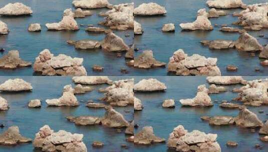 蓝色大海中的岩石高清在线视频素材下载