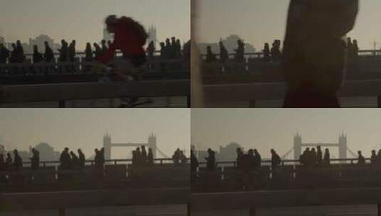 大桥上的行人的剪影高清在线视频素材下载