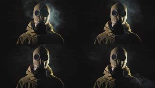烟雾环绕着穿戴着防毒面具的男人高清在线视频素材下载
