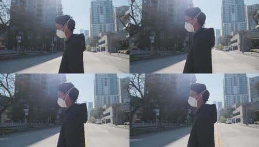 戴着口罩的女人行走在街上高清在线视频素材下载