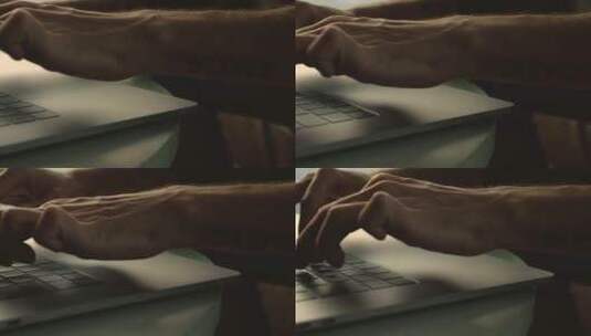 一个人的手在笔记本电脑上打字_1_高清在线视频素材下载