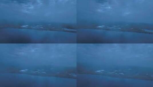 航拍黎明湖岸云雾建筑群高清在线视频素材下载