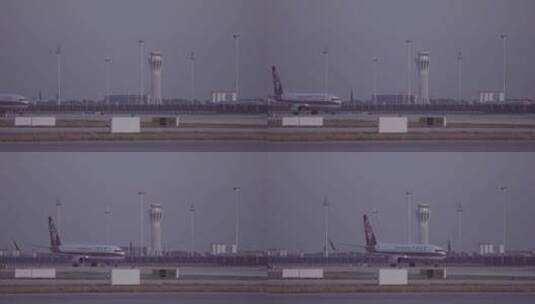 大兴机场 中国联航飞机在西塔台前滑行 日景高清在线视频素材下载