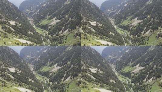 两座大山之间壮观山口的鸟瞰高清在线视频素材下载