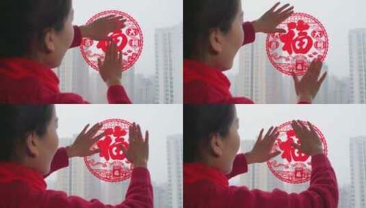 亚洲中国母子春节贴窗花高清在线视频素材下载