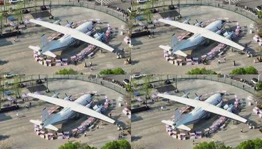 航拍武汉王家墩公园停放的飞机街景高清在线视频素材下载
