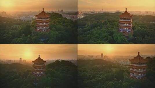 航拍夕阳下的广州鸿鹄楼高清在线视频素材下载