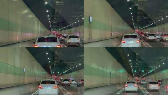 郑州堵车缓行下穿隧道车窗视角1高清在线视频素材下载