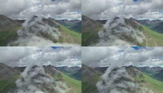 航拍川西云雾缭绕的大哇梁子垭口群峰风光高清在线视频素材下载
