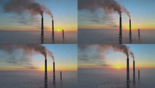 夕阳下燃煤电厂烟囱排放黑烟高清在线视频素材下载
