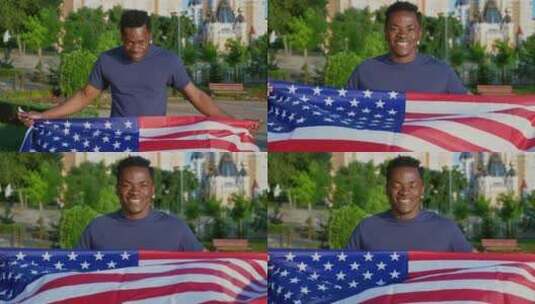 相机放大爱国者微笑的美国黑人手持美国国旗高清在线视频素材下载