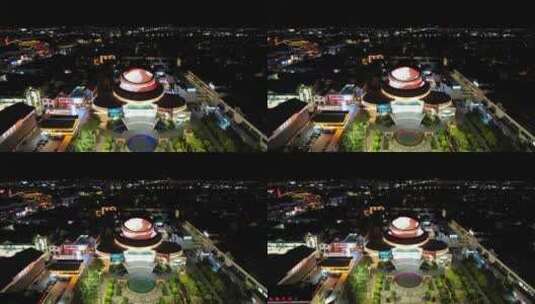 云南丽江文化艺术中心夜景灯光航拍高清在线视频素材下载