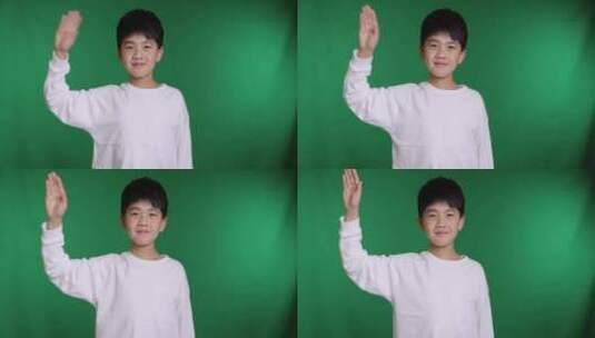 帅气的中国小男孩做手势挥手再见8K实拍高清在线视频素材下载