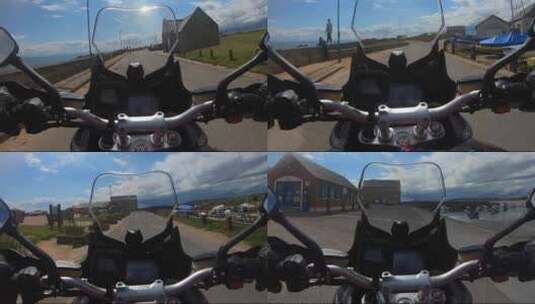 骑摩托车的人骑着摩托车去苏格兰的一个港口高清在线视频素材下载