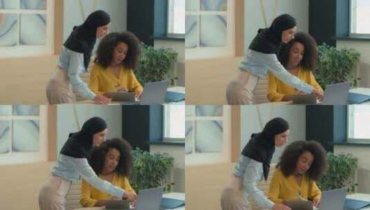 阿拉伯穆斯林伊斯兰女商人在头巾指导新员工高清在线视频素材下载