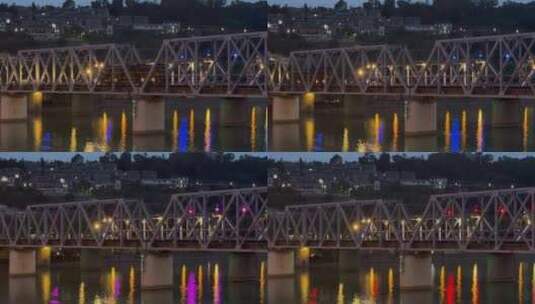 城市河流夜景铁路桥火车头高清在线视频素材下载