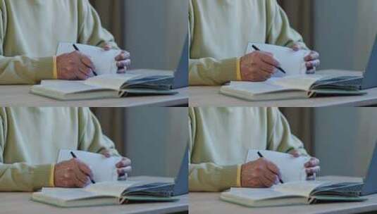 老人，男人，写作，笔记本高清在线视频素材下载