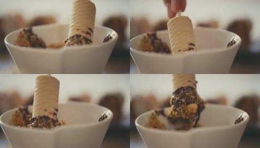 华夫饼卷蘸巧克力卷坚果高清在线视频素材下载