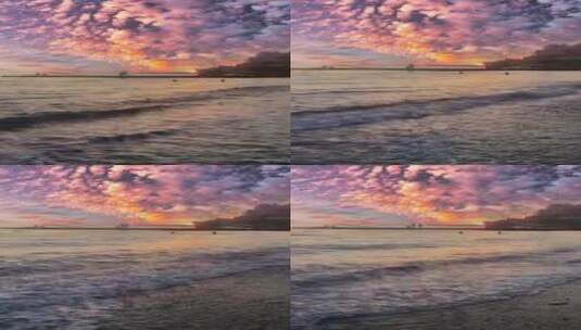 彩色的云下海边浪花高清在线视频素材下载