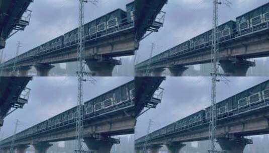 铁路桥河流下雪过火车高清在线视频素材下载