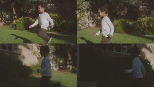 男孩在草坪上奔跑高清在线视频素材下载