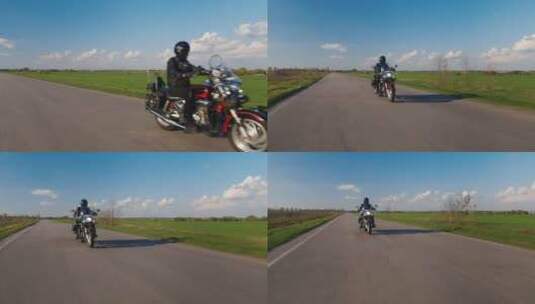 男人在公路上骑摩托车高清在线视频素材下载