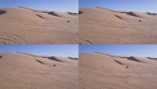 沙丘车在沙漠中穿行的航拍高清在线视频素材下载