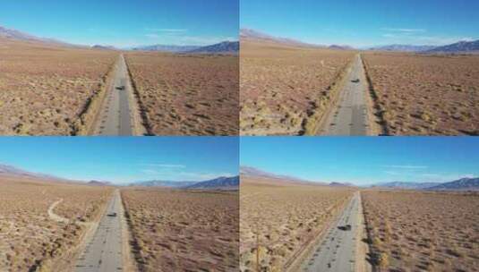 航拍汽车在欧文斯山谷沙漠公路上行驶高清在线视频素材下载