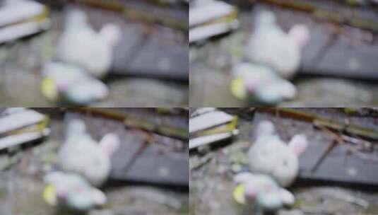 雨中 的 兔子 毛绒玩具 虚变实4K高清在线视频素材下载