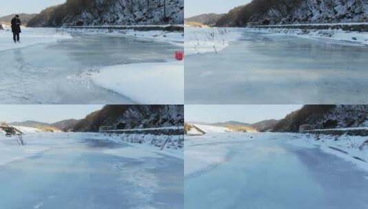 航拍东北冬天雪地行走，滑冰高清在线视频素材下载