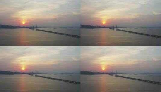 江西省鄱阳湖二桥与朝阳的航拍视频高清在线视频素材下载