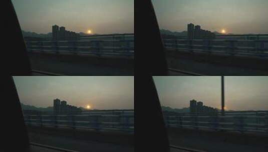 车辆行驶透过车窗外看风景夕阳高清在线视频素材下载