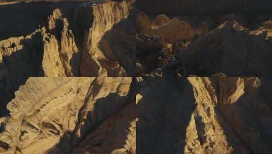 航拍夕阳下金黄色的扎达土林局部景观高清在线视频素材下载