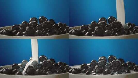 4K美食牛奶倒下蓝莓高清在线视频素材下载