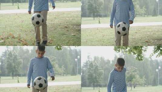 男孩在公园里踢足球高清在线视频素材下载