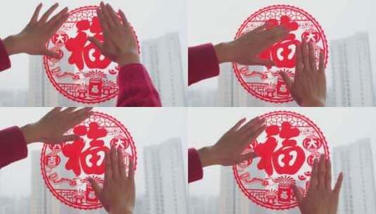 亚洲中国母子春节贴窗花高清在线视频素材下载
