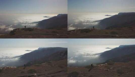 独自在山崖上徒步旅行的男人高清在线视频素材下载