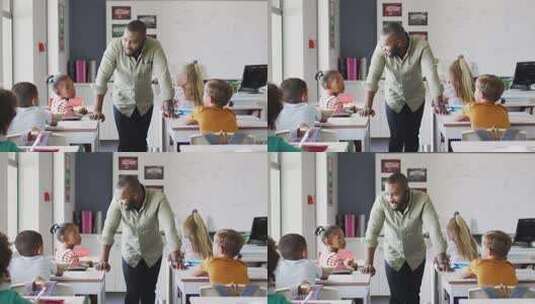 快乐的非裔美国男老师在不同学生的课堂上的视频高清在线视频素材下载