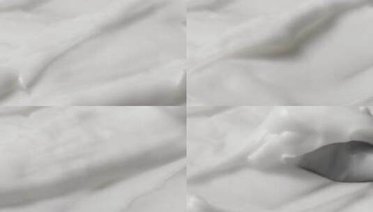 微距拍摄白色的护肤品料体被抹过高清在线视频素材下载