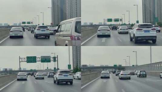郑州高架桥上车流缓行各种变道车窗视角高清在线视频素材下载