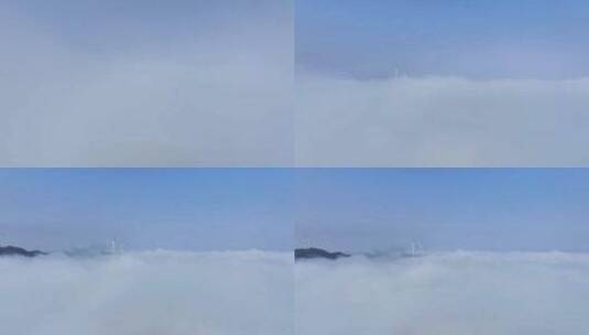 穿越云海见云雾上的风电场航拍高清在线视频素材下载