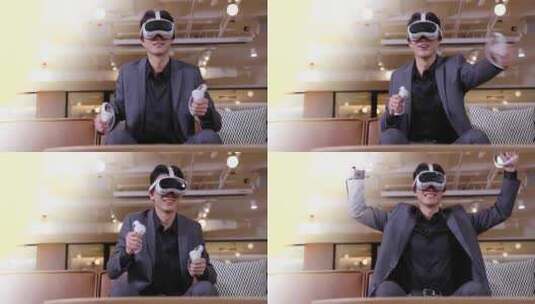 商务人士坐在沙发上玩VR游戏机高清在线视频素材下载